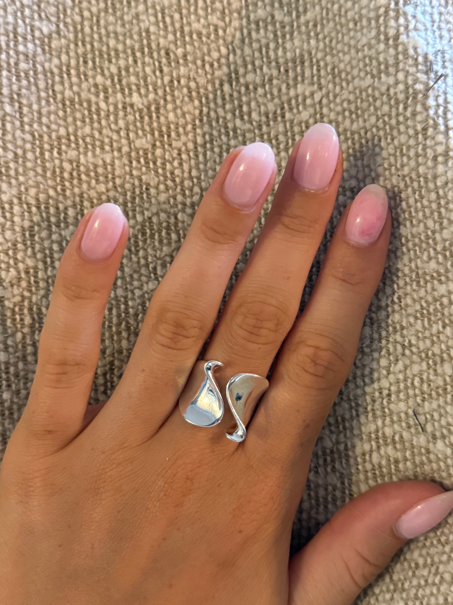 The Mirrored Wave Ring