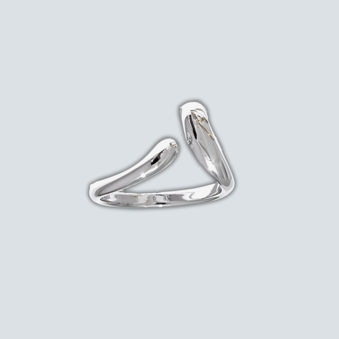 Silver ring on a light gray background