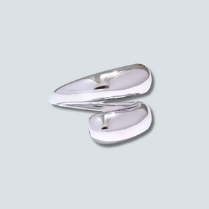 Silver ring on a light gray background