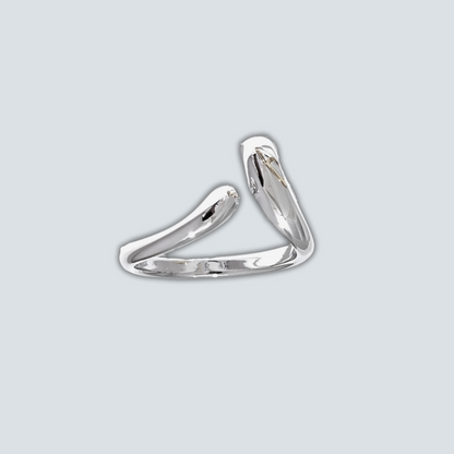 Silver ring on a light gray background