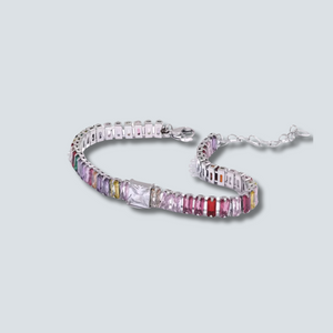Multicolored gemstone bracelet on a light gray background